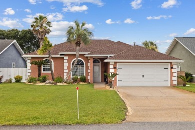 Nestled within Bid-A-Wee, a golf-cart friendly community of on Holiday Golf Club in Florida - for sale on GolfHomes.com, golf home, golf lot