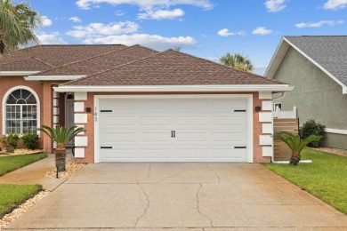 Nestled within Bid-A-Wee, a golf-cart friendly community of on Holiday Golf Club in Florida - for sale on GolfHomes.com, golf home, golf lot