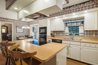 Nestled on a spectacular lot overlooking the first hole of on Orange Tree Golf Club in Florida - for sale on GolfHomes.com, golf home, golf lot