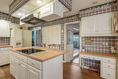 Nestled on a spectacular lot overlooking the first hole of on Orange Tree Golf Club in Florida - for sale on GolfHomes.com, golf home, golf lot