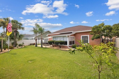 Nestled within Bid-A-Wee, a golf-cart friendly community of on Holiday Golf Club in Florida - for sale on GolfHomes.com, golf home, golf lot