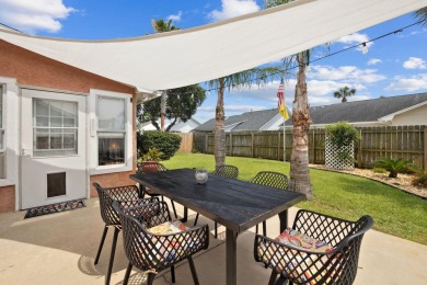 Nestled within Bid-A-Wee, a golf-cart friendly community of on Holiday Golf Club in Florida - for sale on GolfHomes.com, golf home, golf lot