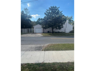 Corner lot home in the heart of College Park. The property sits on Dubsdread Golf Course in Florida - for sale on GolfHomes.com, golf home, golf lot