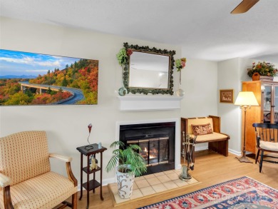 Discover comfort & style in this spacious bottom-level condo on Waynesville Country Club Inn in North Carolina - for sale on GolfHomes.com, golf home, golf lot