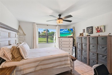 Wake up every day to lush golf course views in this beautifully on Sunrise Lakes Phase IV Golf Course in Florida - for sale on GolfHomes.com, golf home, golf lot