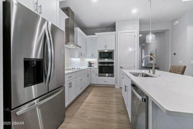 The Avery is a 3 bedroom, 2 bath home featuring an open concept! on Plantation Bay Golf and Country Club in Florida - for sale on GolfHomes.com, golf home, golf lot