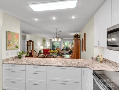 Discover comfort & style in this spacious bottom-level condo on Waynesville Country Club Inn in North Carolina - for sale on GolfHomes.com, golf home, golf lot