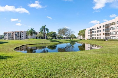 Wake up every day to lush golf course views in this beautifully on Sunrise Lakes Phase IV Golf Course in Florida - for sale on GolfHomes.com, golf home, golf lot