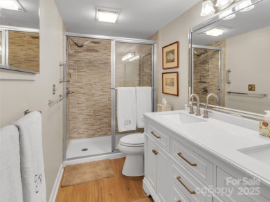 Discover comfort & style in this spacious bottom-level condo on Waynesville Country Club Inn in North Carolina - for sale on GolfHomes.com, golf home, golf lot