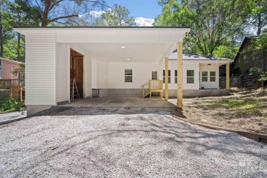SELLERS WILL ENTERTAIN OFFERS BETWEEN $310,000 AND $330,000 on Lake Forest Yacht and Country Club in Alabama - for sale on GolfHomes.com, golf home, golf lot