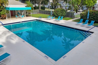 A perfect blend of refined elegance and relaxed comfort awaits on Wycliffe Golf and Country Club in Florida - for sale on GolfHomes.com, golf home, golf lot