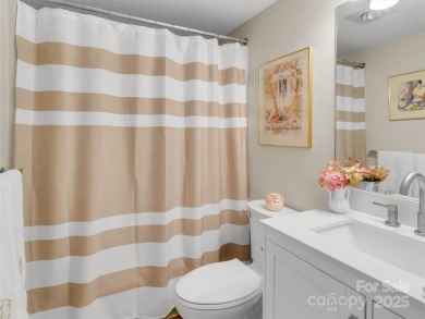 Discover comfort & style in this spacious bottom-level condo on Waynesville Country Club Inn in North Carolina - for sale on GolfHomes.com, golf home, golf lot