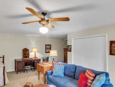 Discover comfort & style in this spacious bottom-level condo on Waynesville Country Club Inn in North Carolina - for sale on GolfHomes.com, golf home, golf lot
