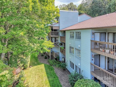 Discover comfort & style in this spacious bottom-level condo on Waynesville Country Club Inn in North Carolina - for sale on GolfHomes.com, golf home, golf lot