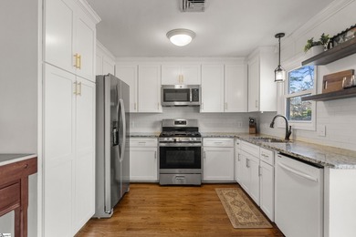 408 Camelot Dr is a beautifully appointed home tucked into the on Holly Tree Country Club in South Carolina - for sale on GolfHomes.com, golf home, golf lot