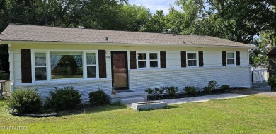 Charming and move-in ready, this  single-level ranch home is on Whittle Springs Golf Course in Tennessee - for sale on GolfHomes.com, golf home, golf lot