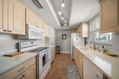 Experience quiet, carefree living in this immaculately on Belleview Biltmore Golf Club in Florida - for sale on GolfHomes.com, golf home, golf lot