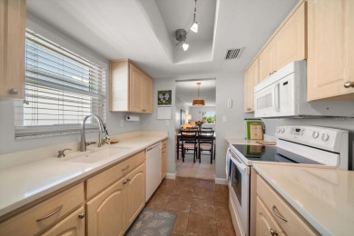 Experience quiet, carefree living in this immaculately on Belleview Biltmore Golf Club in Florida - for sale on GolfHomes.com, golf home, golf lot