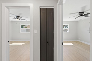 Welcome to this beautifully remodeled 3 bedroom, 2 bathroom pool on Mangrove Bay Golf Course in Florida - for sale on GolfHomes.com, golf home, golf lot