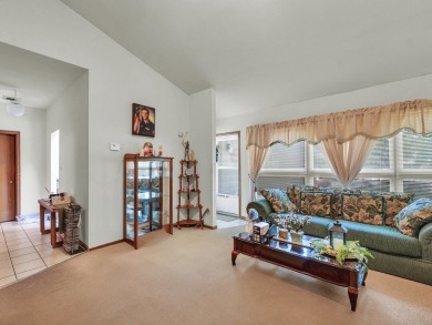 This tri-level home is ideally situated on Hole No. 1 of Willow on Willow Pond Golf Course in Illinois - for sale on GolfHomes.com, golf home, golf lot