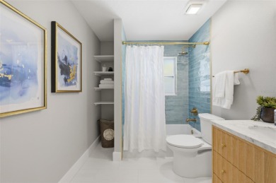 Welcome to this beautifully remodeled 3 bedroom, 2 bathroom pool on Mangrove Bay Golf Course in Florida - for sale on GolfHomes.com, golf home, golf lot