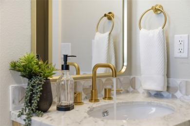 Welcome to this beautifully remodeled 3 bedroom, 2 bathroom pool on Mangrove Bay Golf Course in Florida - for sale on GolfHomes.com, golf home, golf lot