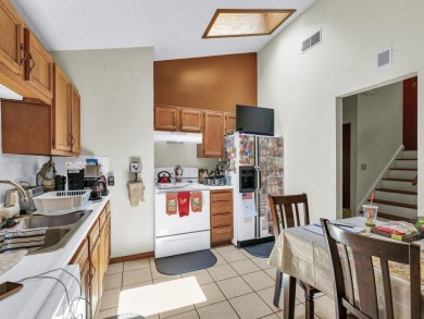 This tri-level home is ideally situated on Hole No. 1 of Willow on Willow Pond Golf Course in Illinois - for sale on GolfHomes.com, golf home, golf lot