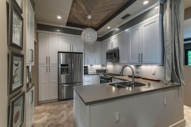 Bring your most discerning buyer to this truly exceptional home on Lake Worth Municipal Golf Course in Florida - for sale on GolfHomes.com, golf home, golf lot