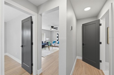 Welcome to this beautifully remodeled 3 bedroom, 2 bathroom pool on Mangrove Bay Golf Course in Florida - for sale on GolfHomes.com, golf home, golf lot