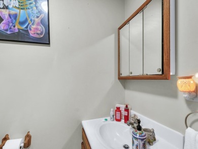 This tri-level home is ideally situated on Hole No. 1 of Willow on Willow Pond Golf Course in Illinois - for sale on GolfHomes.com, golf home, golf lot