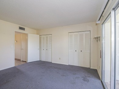 First Floor 1BDR/1BA condo with lake views in active 55+ on The American Golf Club in Florida - for sale on GolfHomes.com, golf home, golf lot