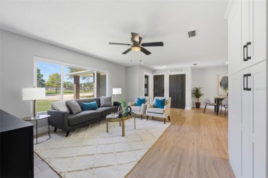 Welcome to this beautifully remodeled 3 bedroom, 2 bathroom pool on Mangrove Bay Golf Course in Florida - for sale on GolfHomes.com, golf home, golf lot