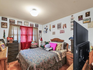 This tri-level home is ideally situated on Hole No. 1 of Willow on Willow Pond Golf Course in Illinois - for sale on GolfHomes.com, golf home, golf lot
