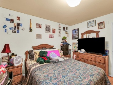 This tri-level home is ideally situated on Hole No. 1 of Willow on Willow Pond Golf Course in Illinois - for sale on GolfHomes.com, golf home, golf lot