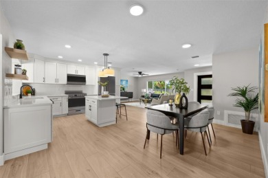 Welcome to this beautifully remodeled 3 bedroom, 2 bathroom pool on Mangrove Bay Golf Course in Florida - for sale on GolfHomes.com, golf home, golf lot