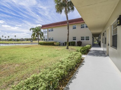 First Floor 1BDR/1BA condo with lake views in active 55+ on The American Golf Club in Florida - for sale on GolfHomes.com, golf home, golf lot