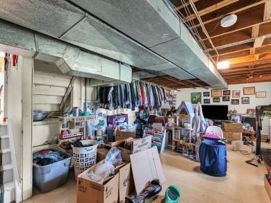 This tri-level home is ideally situated on Hole No. 1 of Willow on Willow Pond Golf Course in Illinois - for sale on GolfHomes.com, golf home, golf lot