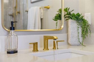Welcome to this beautifully remodeled 3 bedroom, 2 bathroom pool on Mangrove Bay Golf Course in Florida - for sale on GolfHomes.com, golf home, golf lot