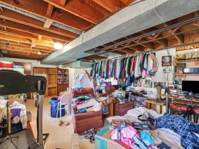 This tri-level home is ideally situated on Hole No. 1 of Willow on Willow Pond Golf Course in Illinois - for sale on GolfHomes.com, golf home, golf lot
