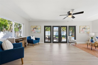 Welcome to this beautifully remodeled 3 bedroom, 2 bathroom pool on Mangrove Bay Golf Course in Florida - for sale on GolfHomes.com, golf home, golf lot