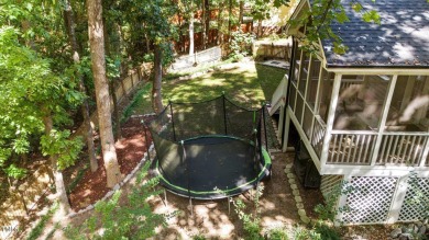 Welcome to this beautiful two-story home on a private, wooded on The Neuse Golf Club in North Carolina - for sale on GolfHomes.com, golf home, golf lot