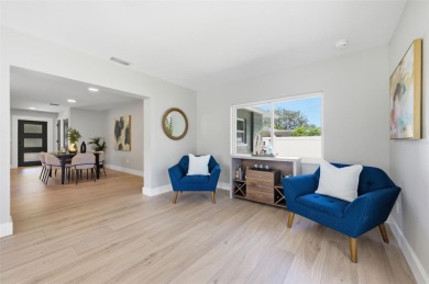 Welcome to this beautifully remodeled 3 bedroom, 2 bathroom pool on Mangrove Bay Golf Course in Florida - for sale on GolfHomes.com, golf home, golf lot