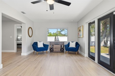 Welcome to this beautifully remodeled 3 bedroom, 2 bathroom pool on Mangrove Bay Golf Course in Florida - for sale on GolfHomes.com, golf home, golf lot