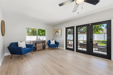 Welcome to this beautifully remodeled 3 bedroom, 2 bathroom pool on Mangrove Bay Golf Course in Florida - for sale on GolfHomes.com, golf home, golf lot