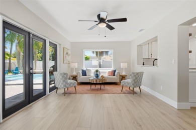 Welcome to this beautifully remodeled 3 bedroom, 2 bathroom pool on Mangrove Bay Golf Course in Florida - for sale on GolfHomes.com, golf home, golf lot