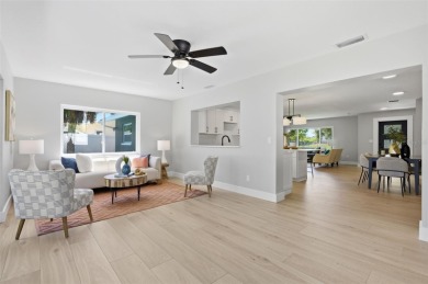 Welcome to this beautifully remodeled 3 bedroom, 2 bathroom pool on Mangrove Bay Golf Course in Florida - for sale on GolfHomes.com, golf home, golf lot