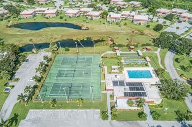 First Floor 1BDR/1BA condo with lake views in active 55+ on The American Golf Club in Florida - for sale on GolfHomes.com, golf home, golf lot