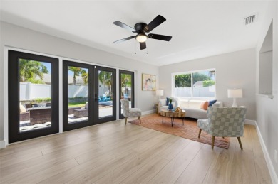 Welcome to this beautifully remodeled 3 bedroom, 2 bathroom pool on Mangrove Bay Golf Course in Florida - for sale on GolfHomes.com, golf home, golf lot