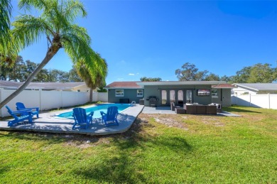 Welcome to this beautifully remodeled 3 bedroom, 2 bathroom pool on Mangrove Bay Golf Course in Florida - for sale on GolfHomes.com, golf home, golf lot
