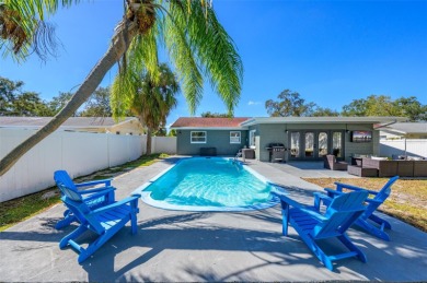 Welcome to this beautifully remodeled 3 bedroom, 2 bathroom pool on Mangrove Bay Golf Course in Florida - for sale on GolfHomes.com, golf home, golf lot